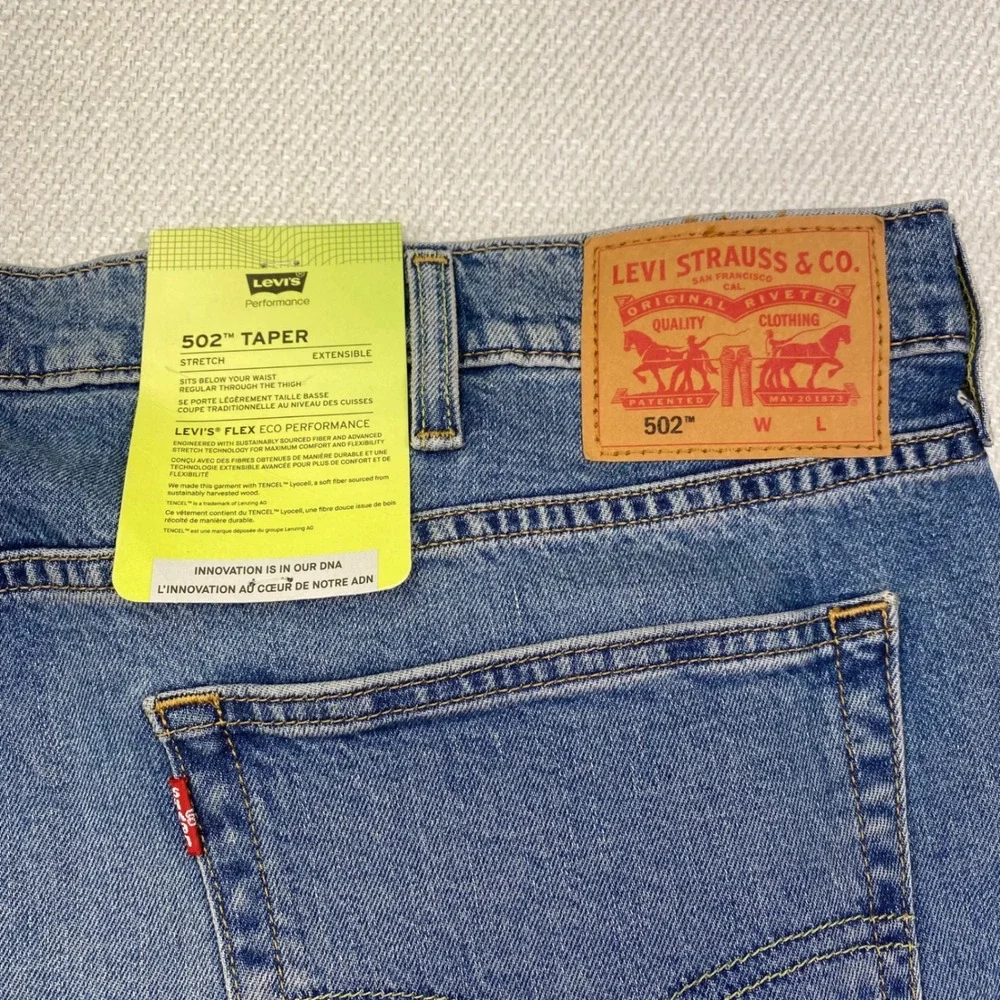 Levi's 502 Taper Jeans Mens 44x32 Blue Medium Wash Stretch Eco Performance New